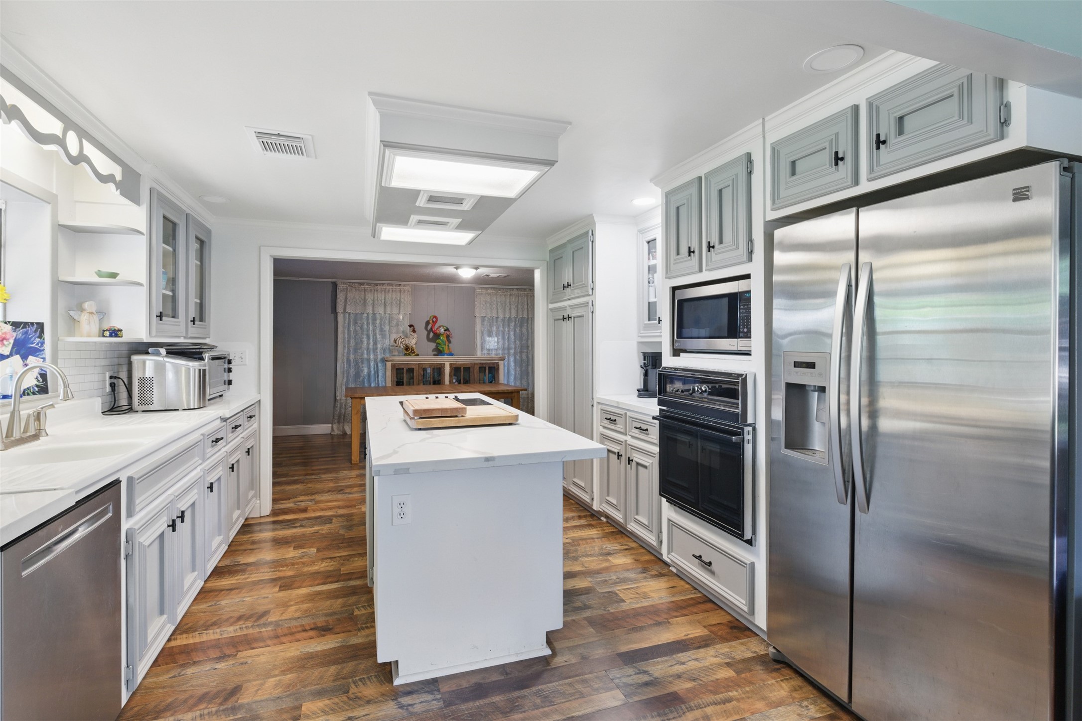 25371 Kickapoo Road Hockley, TX 77447 - Photo 17 of 46 a kitchen with stainless steel appliances a refrigerator and a sink