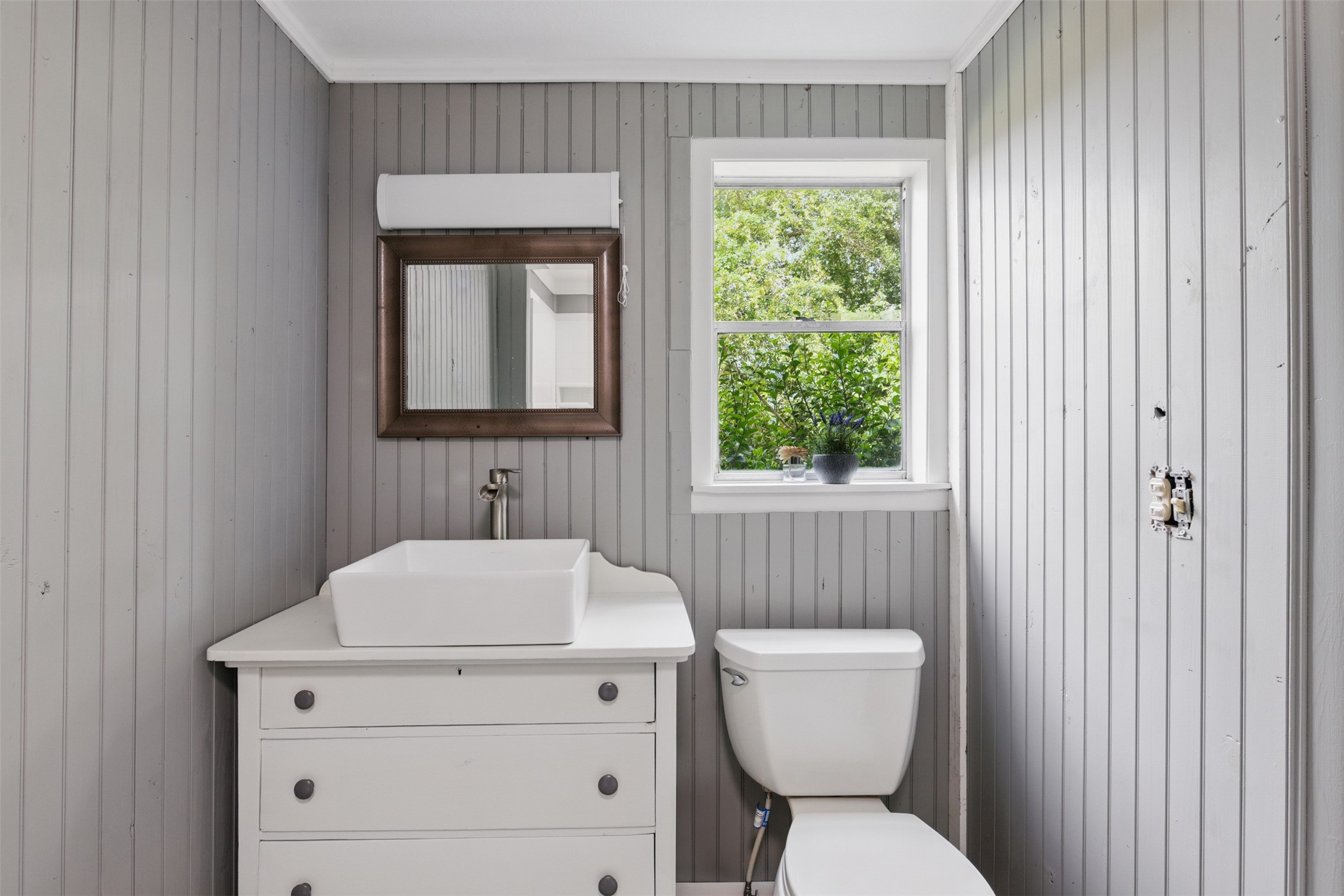 25371 Kickapoo Road Hockley, TX 77447 - Photo 27 of 46 a bathroom with a toilet sink and mirror