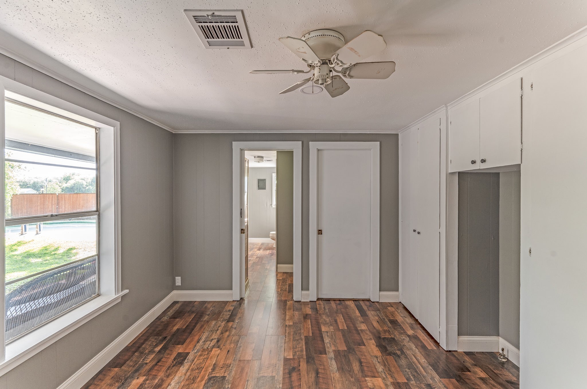 25371 Kickapoo Road Hockley, TX 77447 - Photo 29 of 46 a view of a room with wooden floor and window