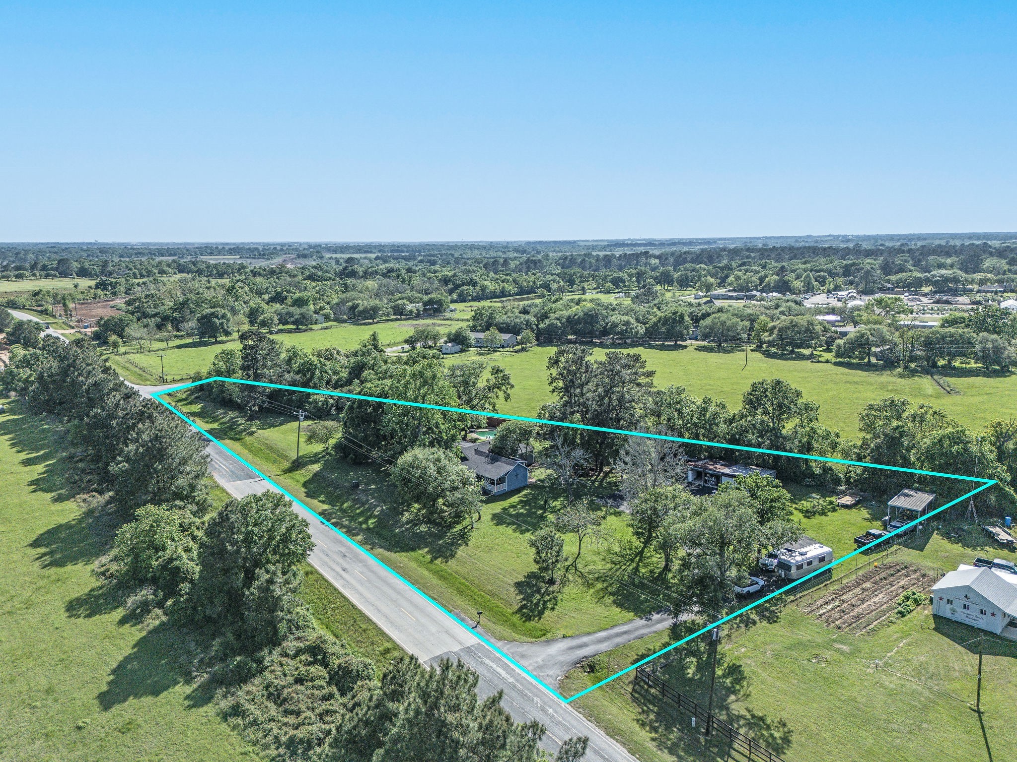 25371 Kickapoo Road Hockley, TX 77447 - Photo 35 of 46 an aerial view of valley and swimming pool