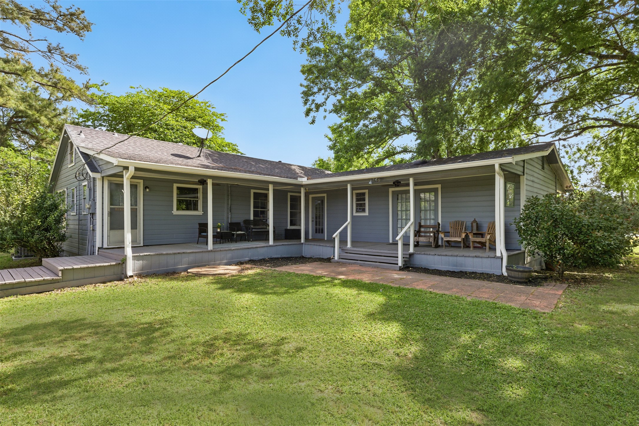25371 Kickapoo Road Hockley, TX 77447 - Photo 7 of 46 a view of a house with a backyard and a patio
