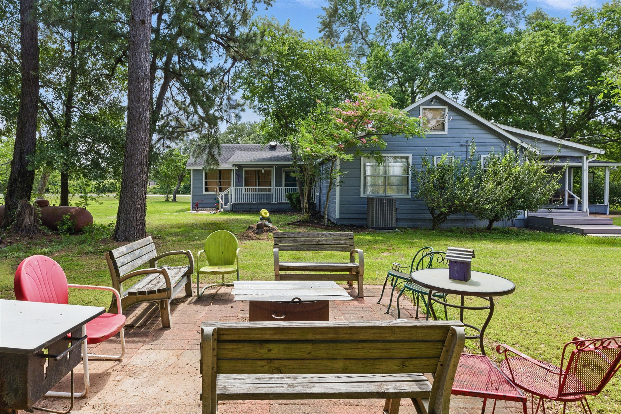 25371 Kickapoo Road Hockley, TX 77447 - Photo 8 of 46 a swimming pool with outdoor seating and yard