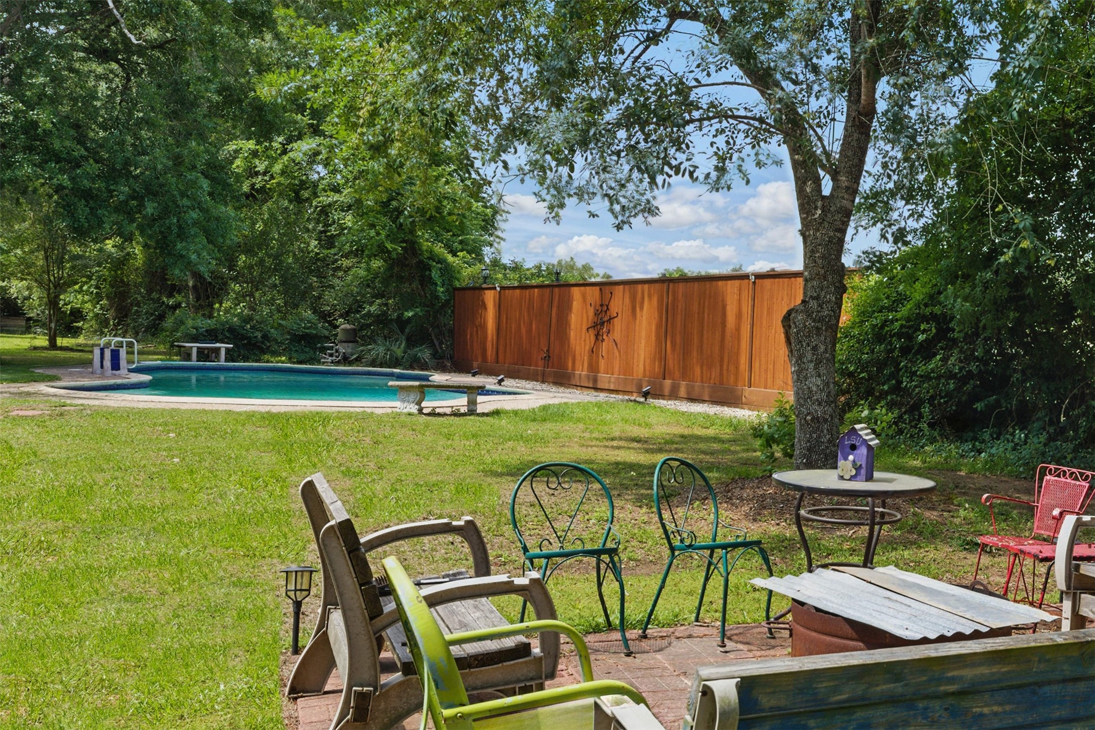 25371 Kickapoo Road Hockley, TX 77447 - Photo 9 of 46 a view of a swimming pool with a patio