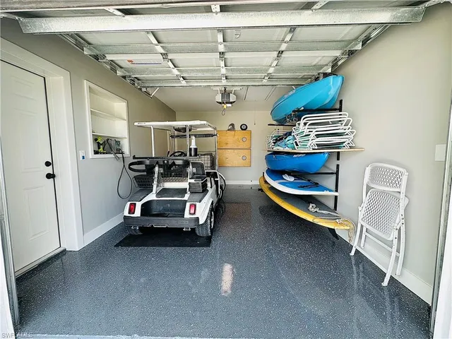 a porch with seating space and hardwood floor