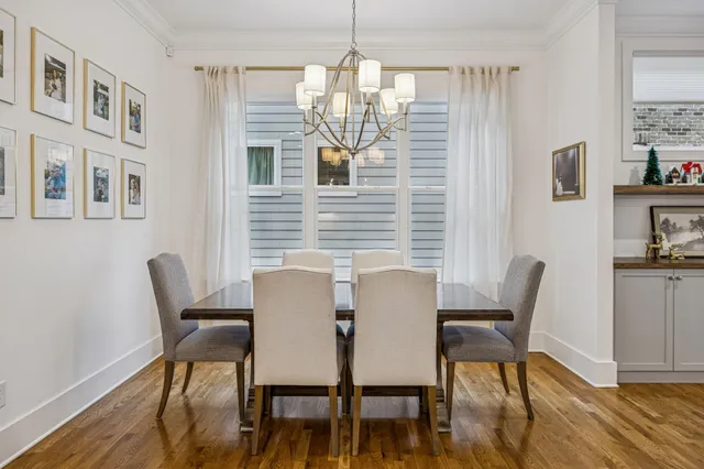 a en suite bathroom with a double vanity sink and a mirror