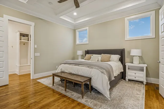 a bedroom with furniture and a window