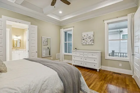 a bathroom with a toilet a sink and a mirror