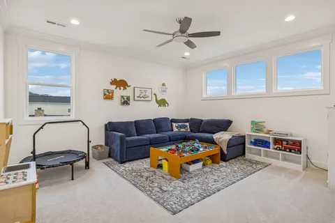 an aerial view of residential house with outdoor space and swimming pool