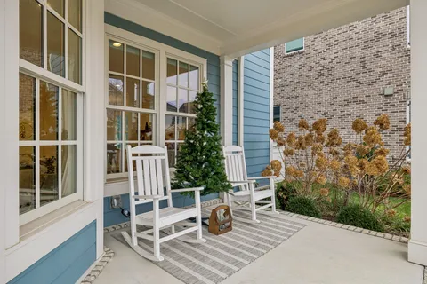 a living room with furniture fireplace and a flat screen tv