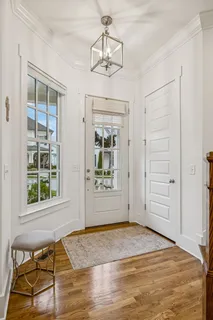 a living room with furniture fireplace and a flat screen tv