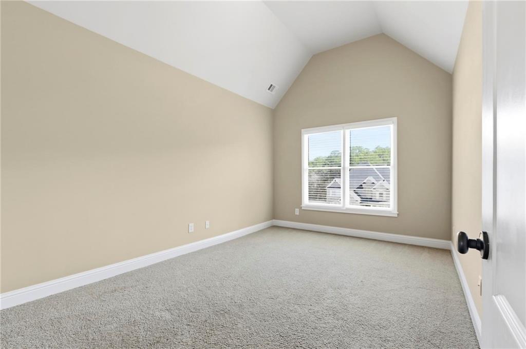 2602 Alcovy Club Drive Dacula, GA 30019 - Photo 24 of 44 an empty room with windows
