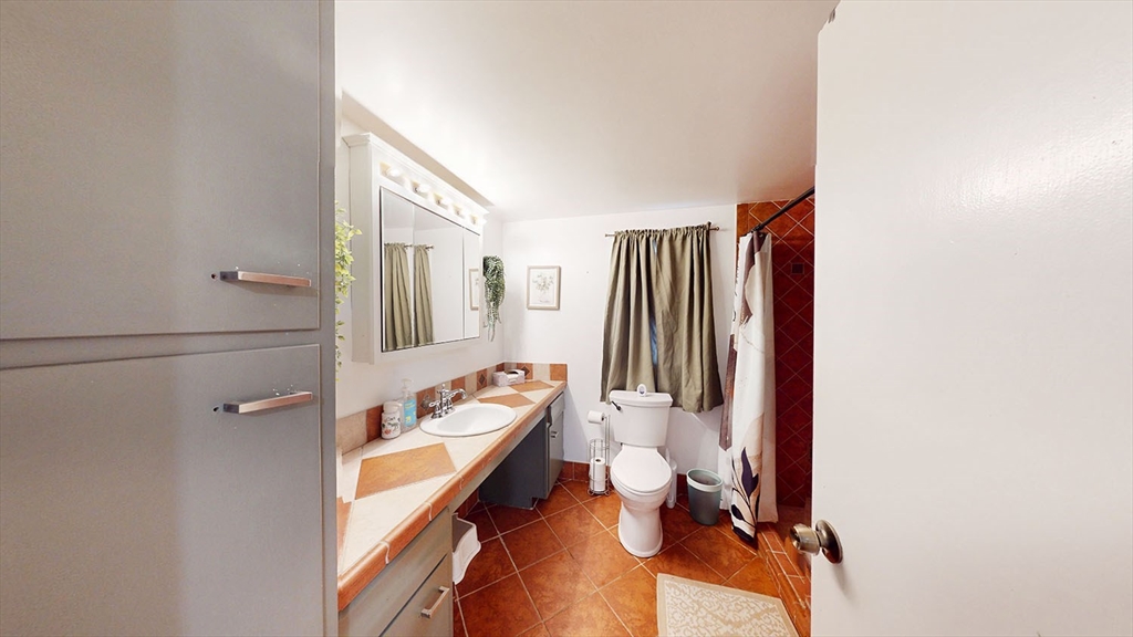 706 Mohawk Road Somerset, MA 02726 - Photo 15 of 33 a bathroom with a sink toilet and shower