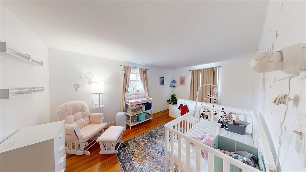 706 Mohawk Road Somerset, MA 02726 - Photo 20 of 33 a bed room with a bed and a window