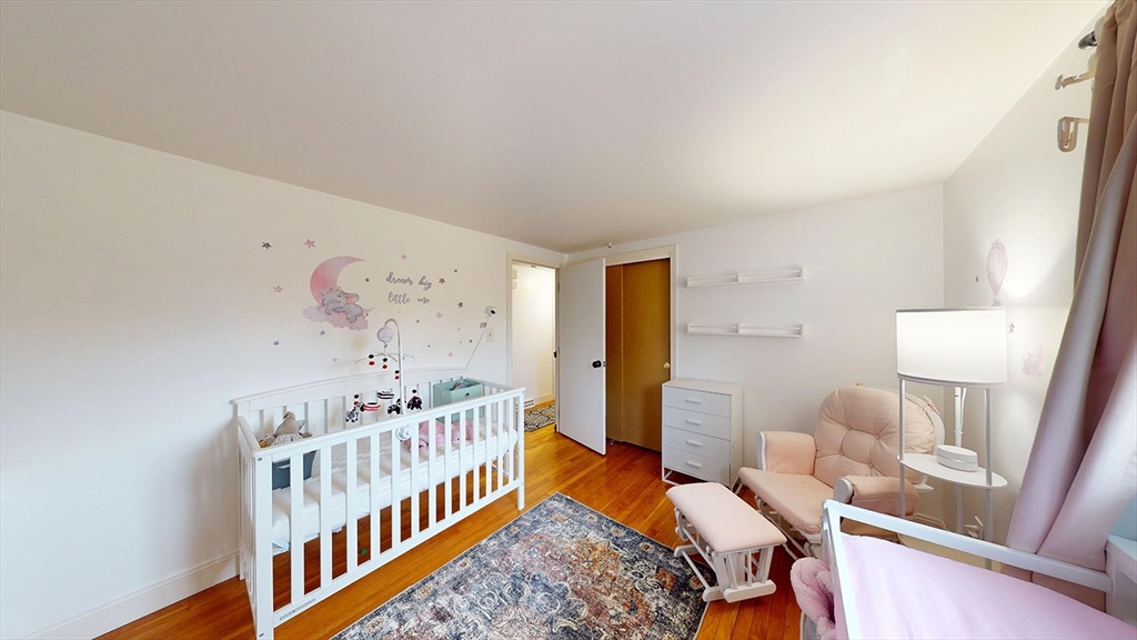 706 Mohawk Road Somerset, MA 02726 - Photo 22 of 33 a bedroom with furniture and a baby crib