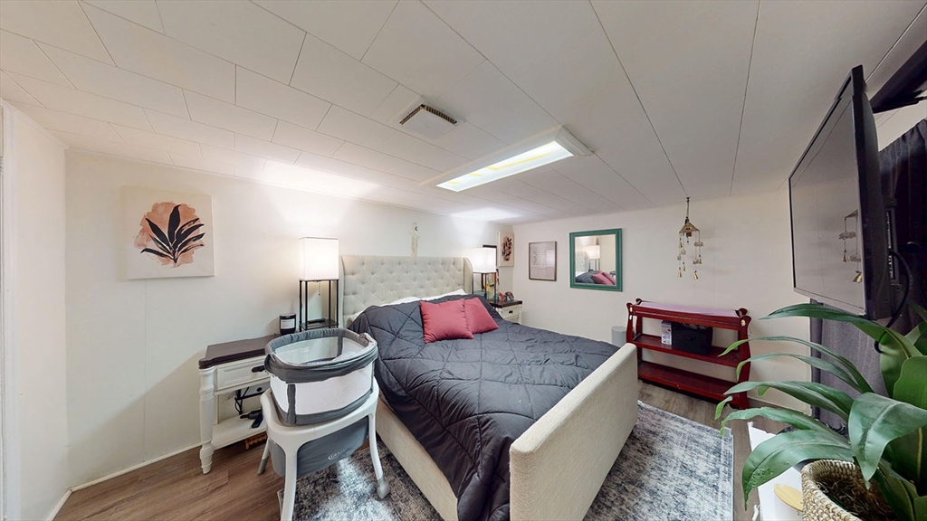 706 Mohawk Road Somerset, MA 02726 - Photo 29 of 33 a living room with furniture and a flat screen tv