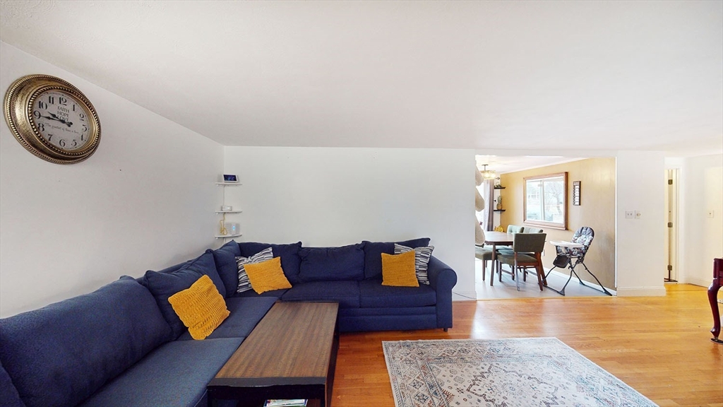 706 Mohawk Road Somerset, MA 02726 - Photo 5 of 33 a living room with furniture and a wooden floor