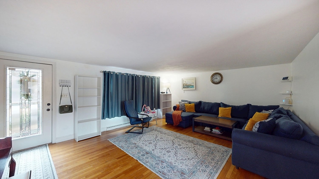 706 Mohawk Road Somerset, MA 02726 - Photo 6 of 33 a living room with furniture and a rug