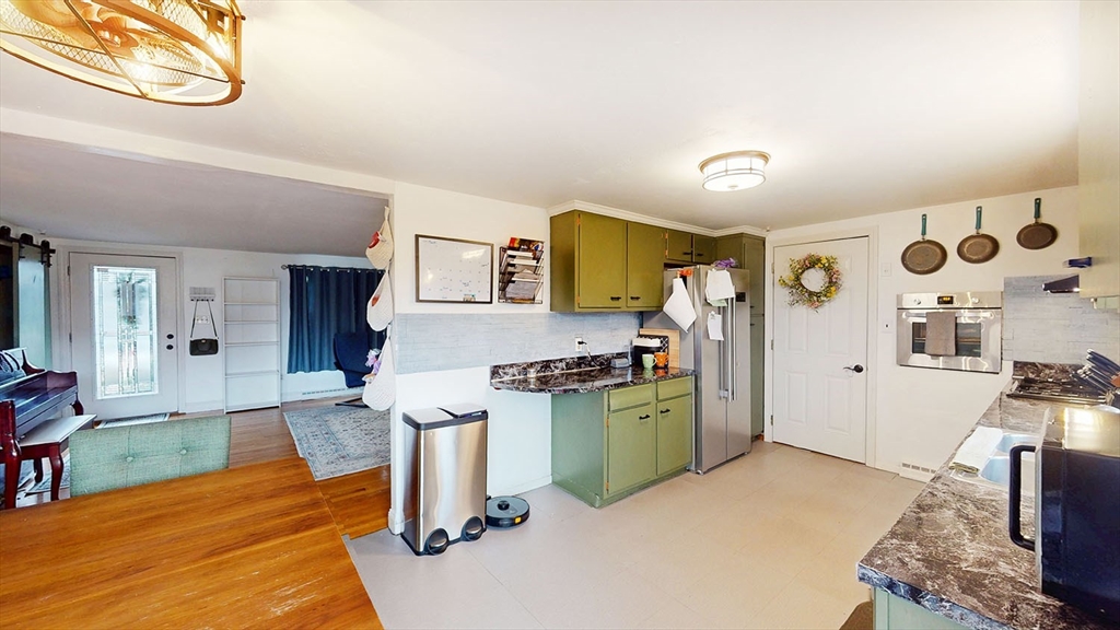 706 Mohawk Road Somerset, MA 02726 - Photo 8 of 33 a living room with furniture and a wooden floor