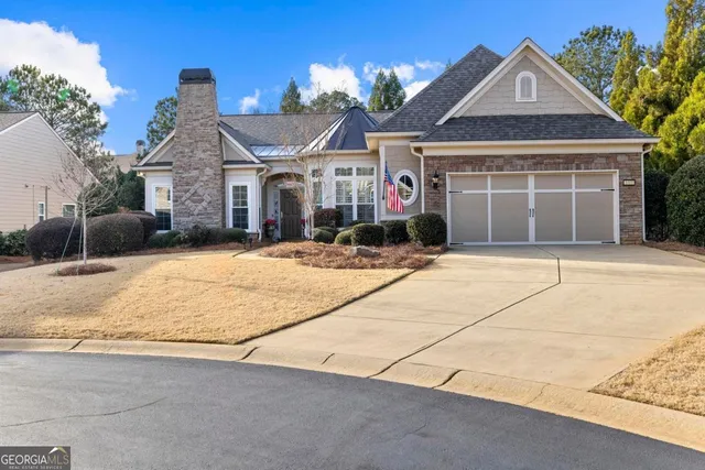 a front view of a house with a outdoor space