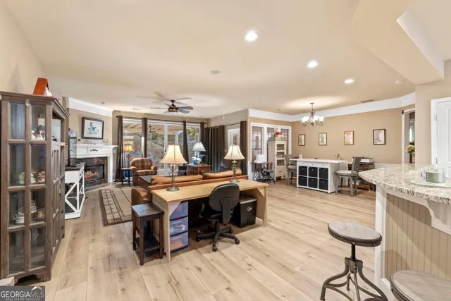 a kitchen with stainless steel appliances granite countertop a sink and cabinets