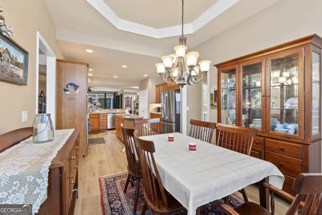 a bathroom with double vanity sinks and a large mirror