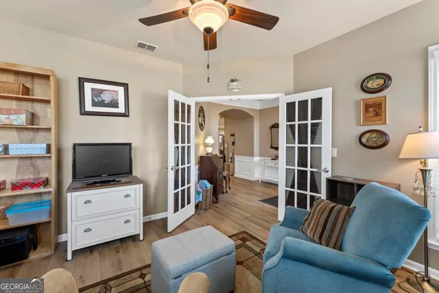 a view of a bathroom from a hallway
