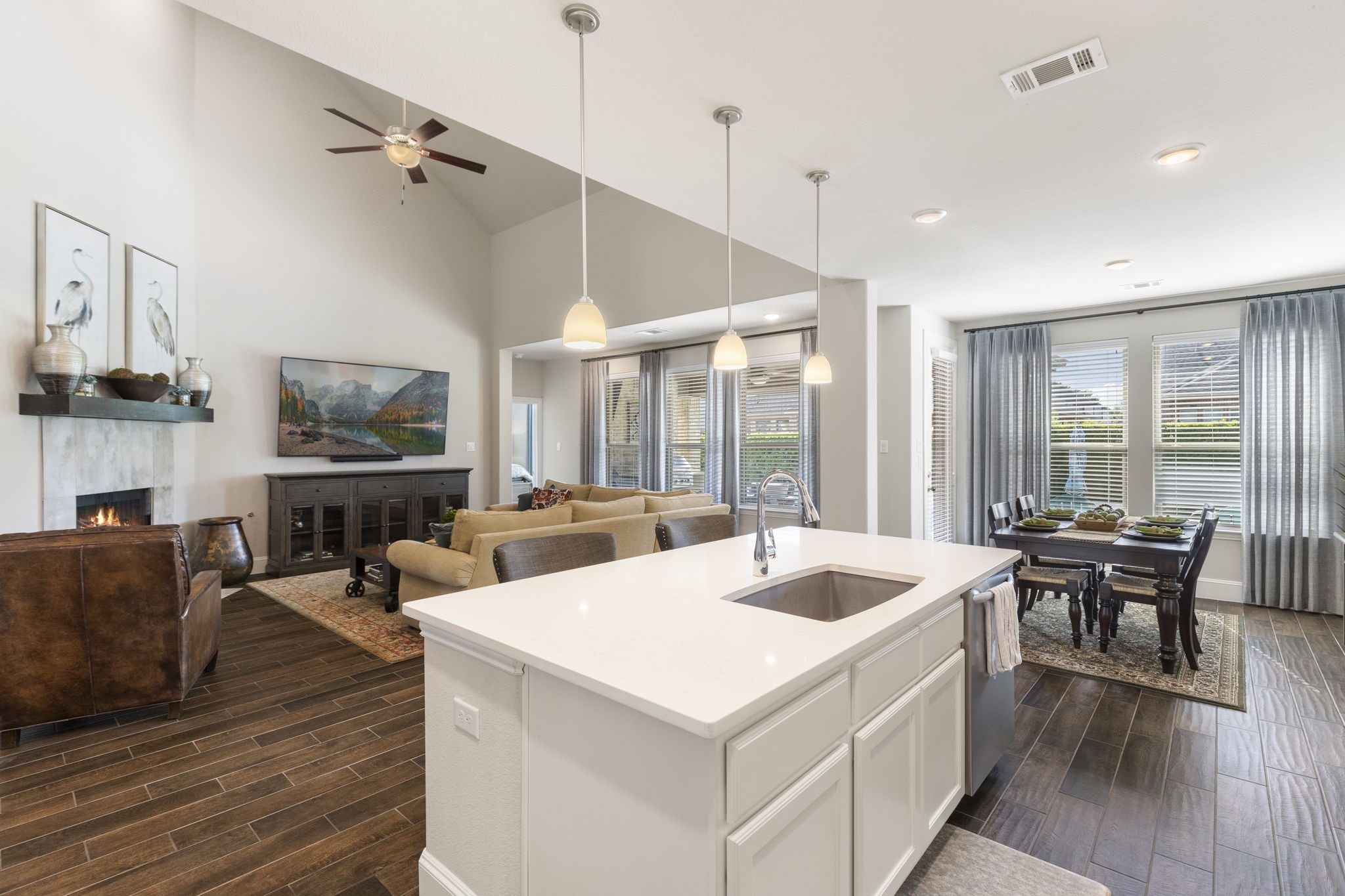 1030 Bat Hawk Court Conroe, TX 77385 - Photo 19 of 47 a living room with fireplace furniture and a large window