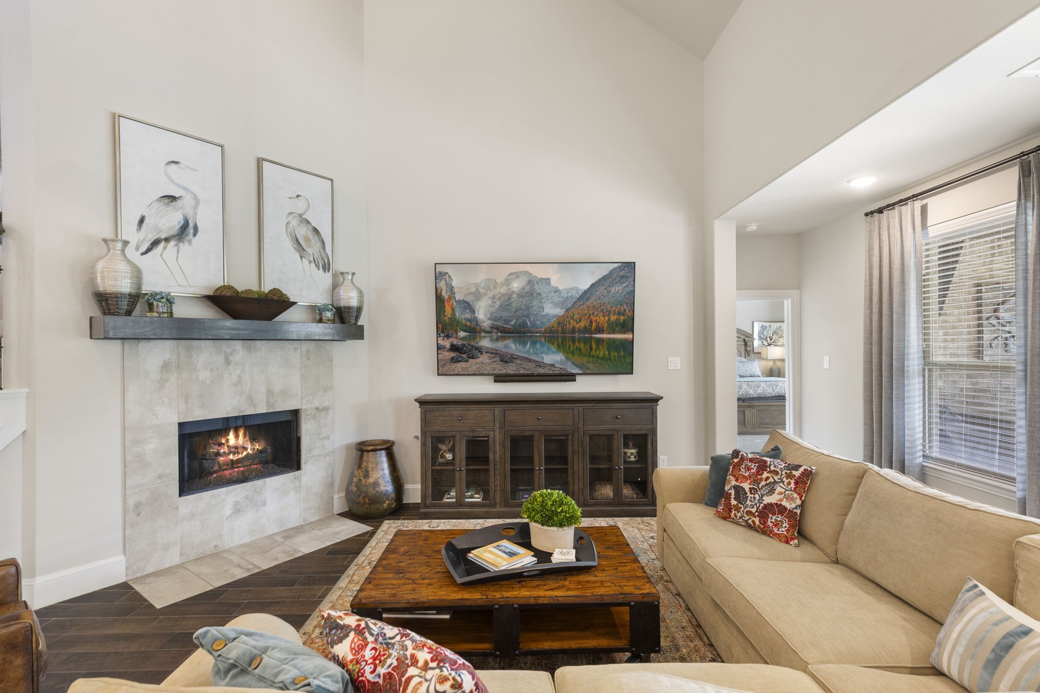 1030 Bat Hawk Court Conroe, TX 77385 - Photo 24 of 47 a living room with furniture and a fireplace