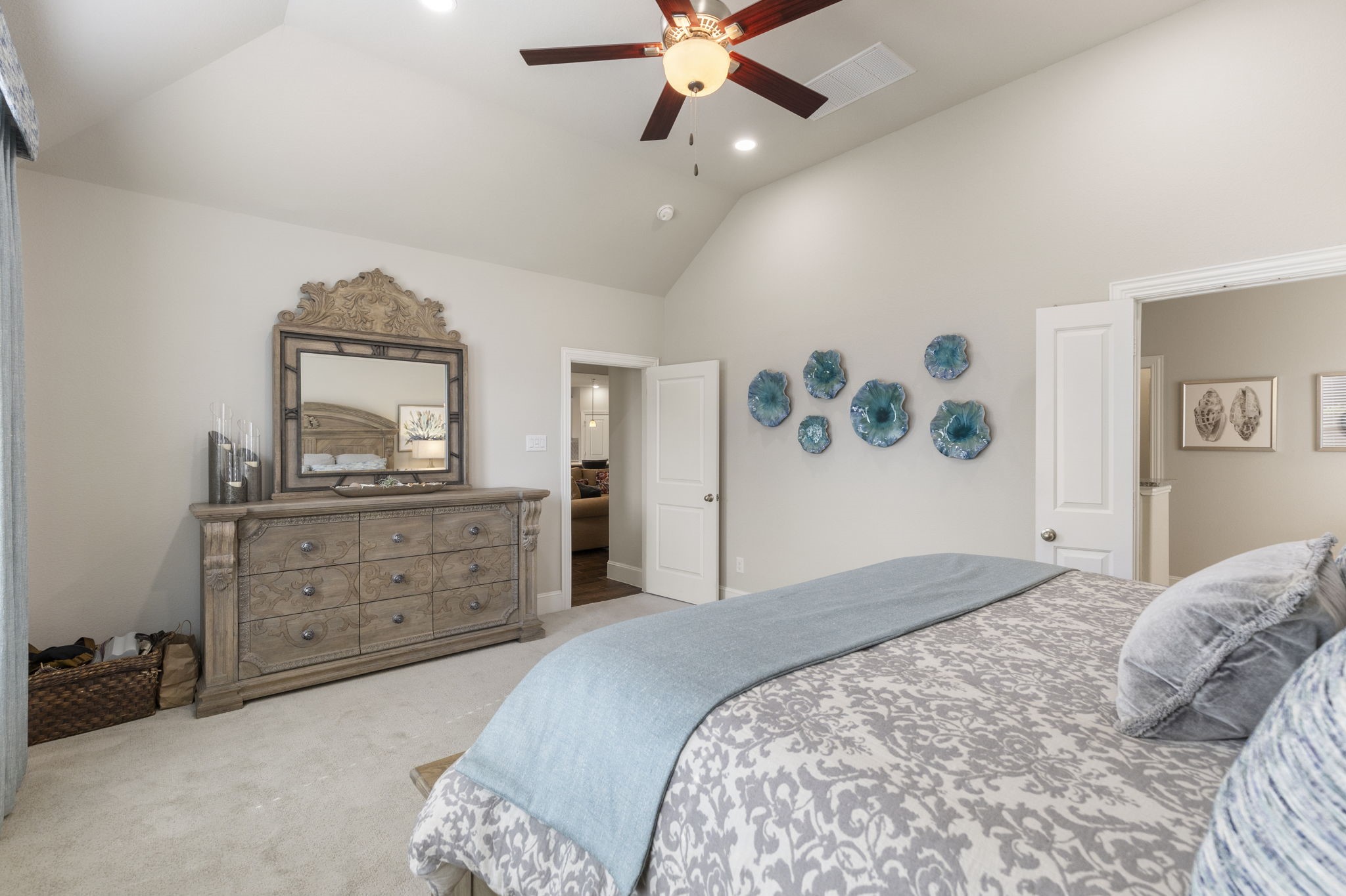 1030 Bat Hawk Court Conroe, TX 77385 - Photo 27 of 47 a bedroom with a bed and a dresser