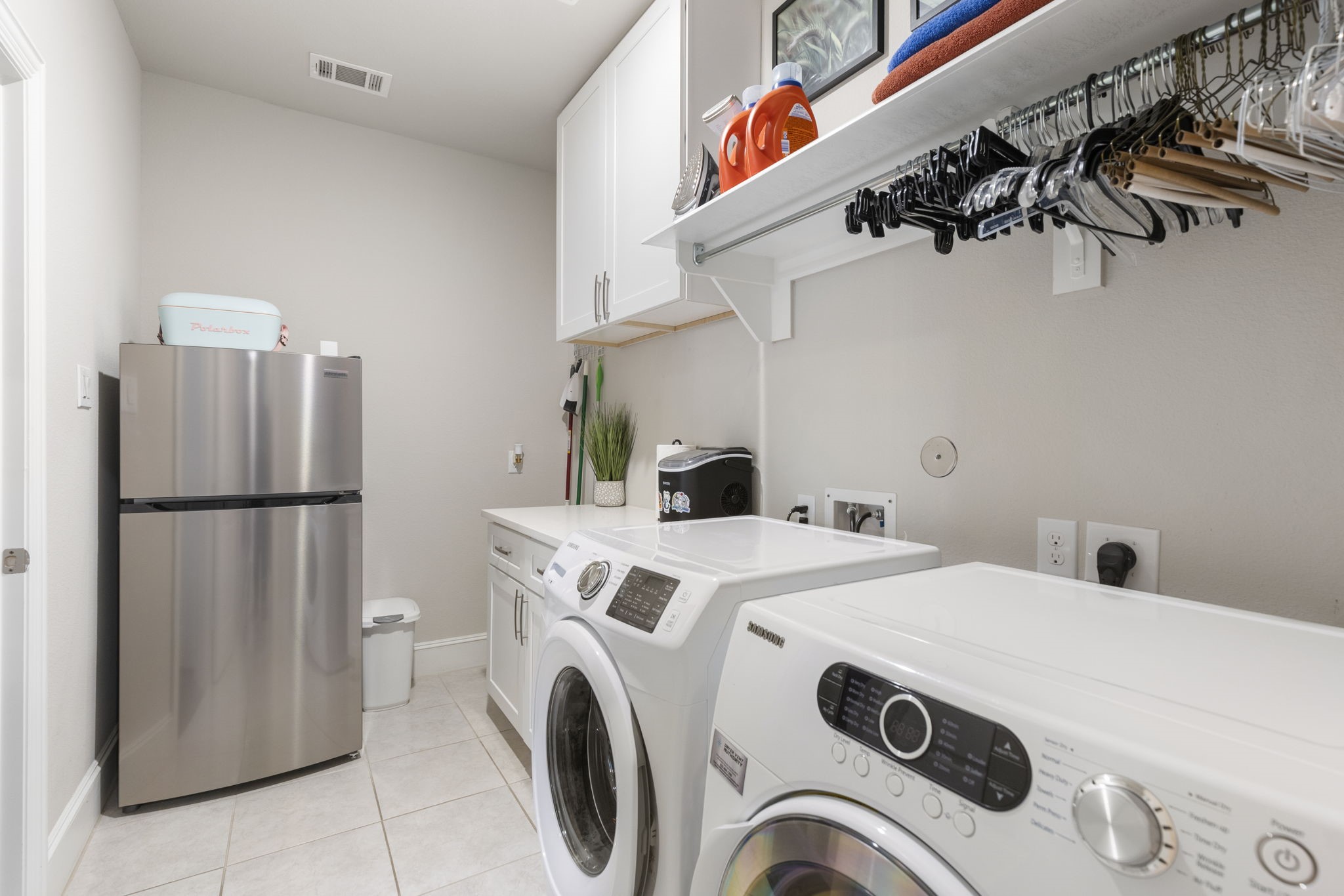 1030 Bat Hawk Court Conroe, TX 77385 - Photo 31 of 47 a utility room with dryer and washer