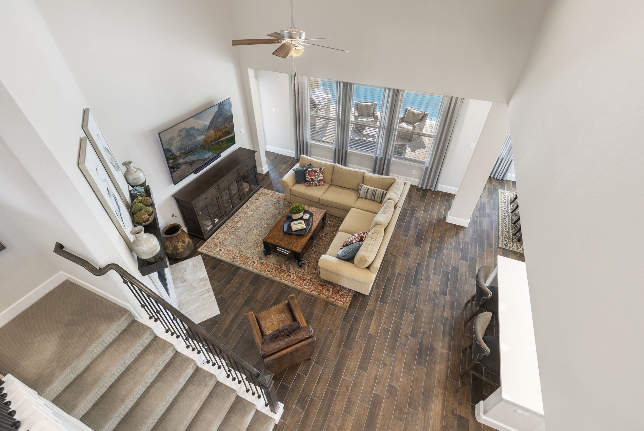1030 Bat Hawk Court Conroe, TX 77385 - Photo 33 of 47 a living room with furniture and a flat screen tv