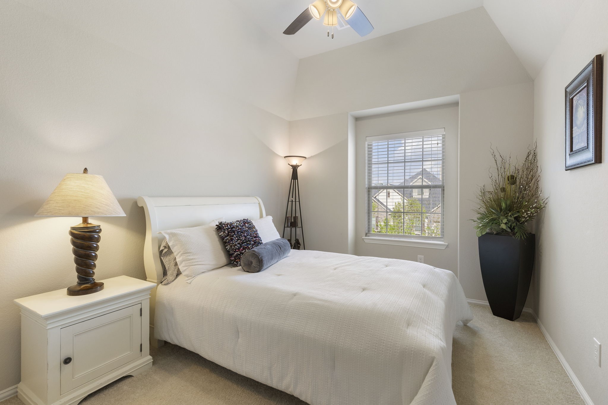 1030 Bat Hawk Court Conroe, TX 77385 - Photo 38 of 47 a bedroom with a bed and a window