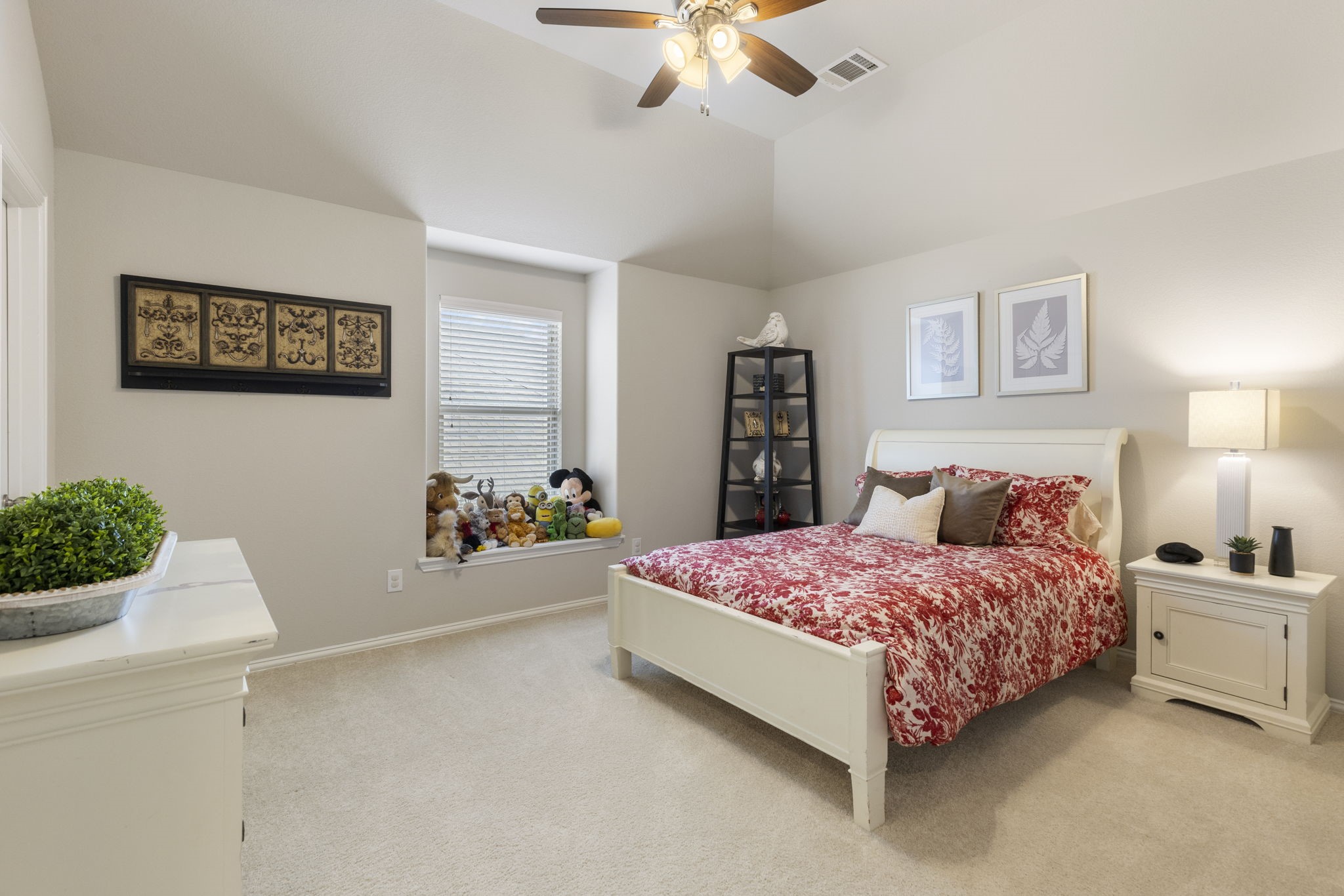 1030 Bat Hawk Court Conroe, TX 77385 - Photo 40 of 47 a spacious bedroom with a bed and a chandelier