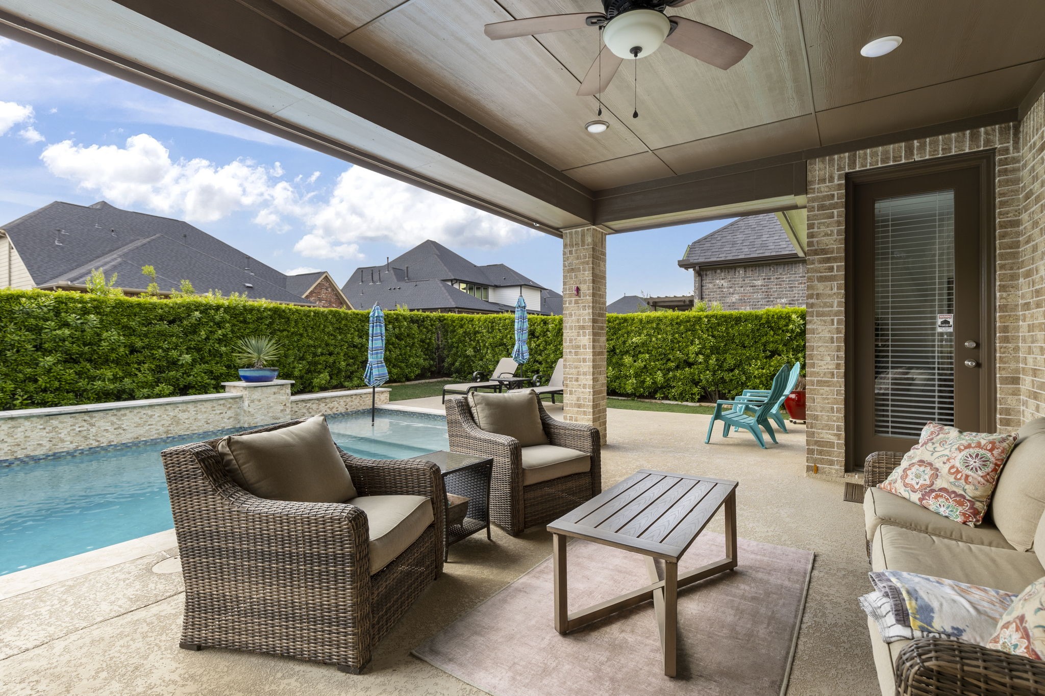 1030 Bat Hawk Court Conroe, TX 77385 - Photo 43 of 47 a outdoor living space with furniture and garden view