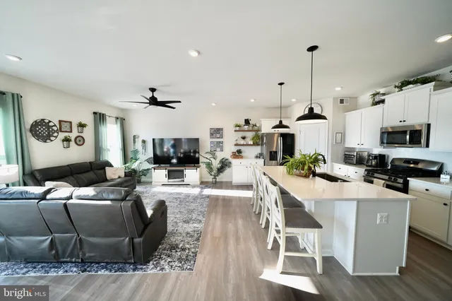 a very nice looking dining room with a table and chairs