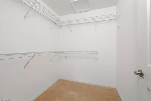 a view of a room with racks on the wall