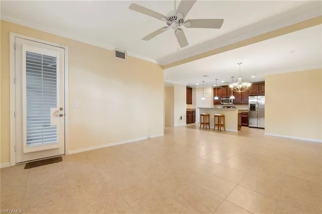 a view of work space with wooden floor and windows