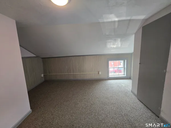 a view of a room with a window