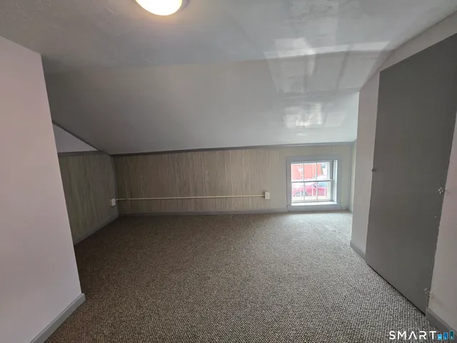 a view of a room with a window