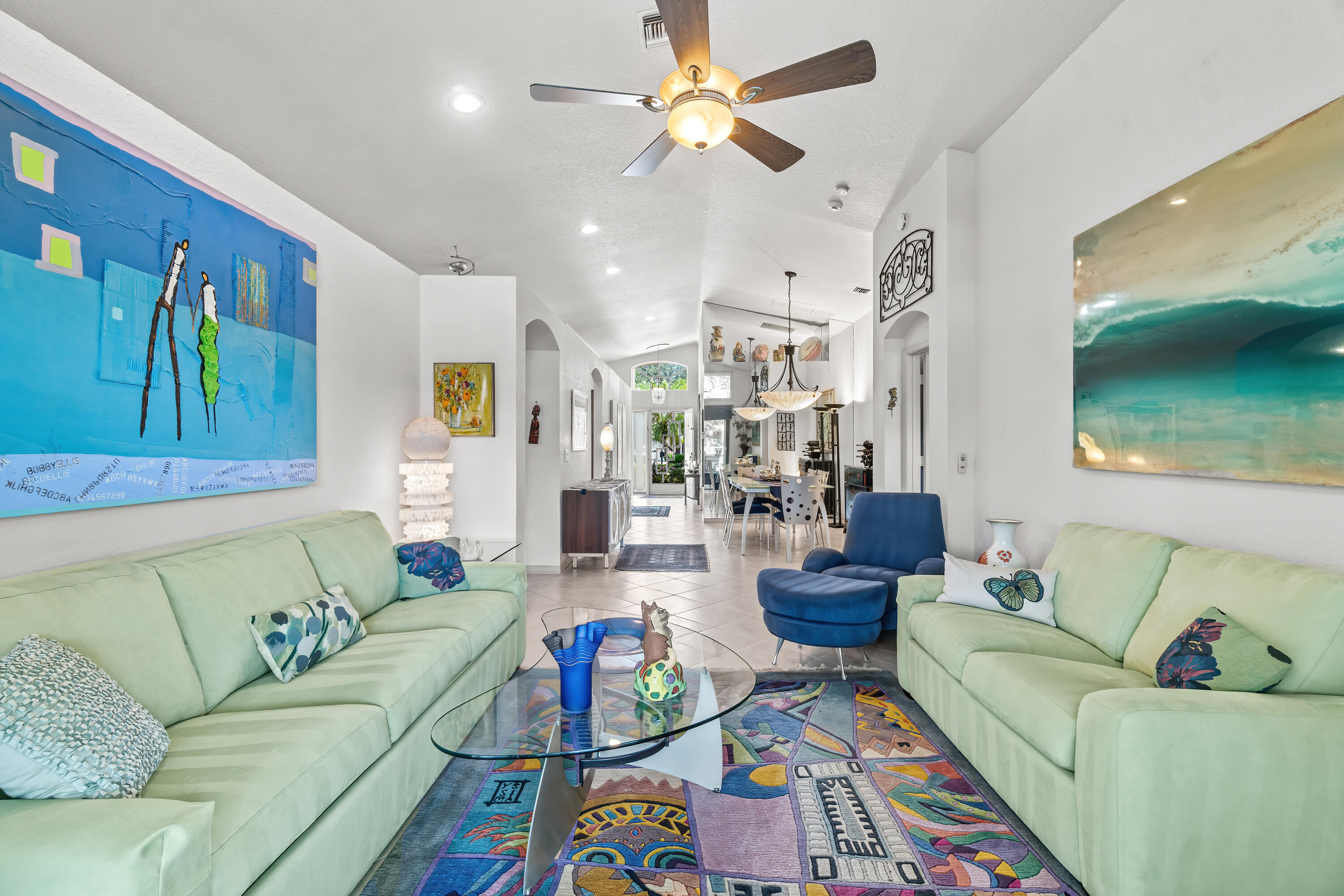 7370 Modena Drive Boynton Beach, FL 33437 - Photo 8 of 37 a living room with furniture and a flat screen tv
