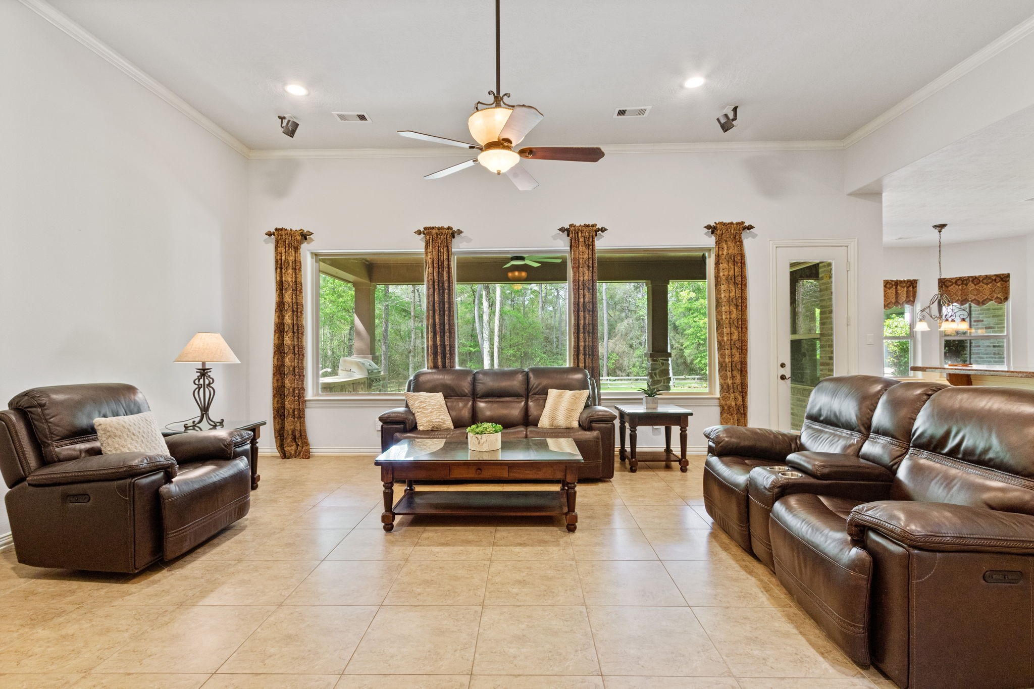 28007 Hickory Court Magnolia, TX 77355 - Photo 11 of 49 a living room with furniture and a large window