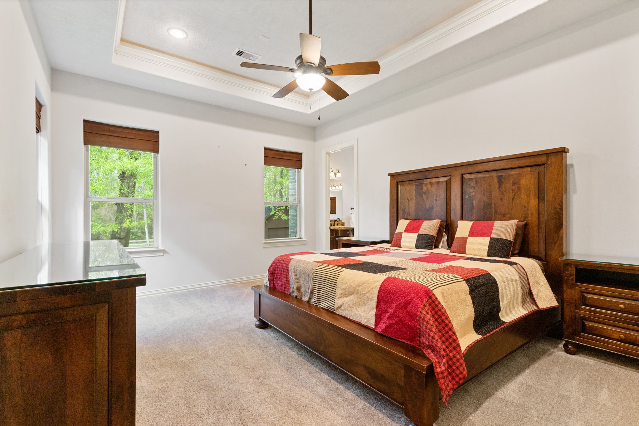 28007 Hickory Court Magnolia, TX 77355 - Photo 20 of 49 a bedroom with a bed and a window