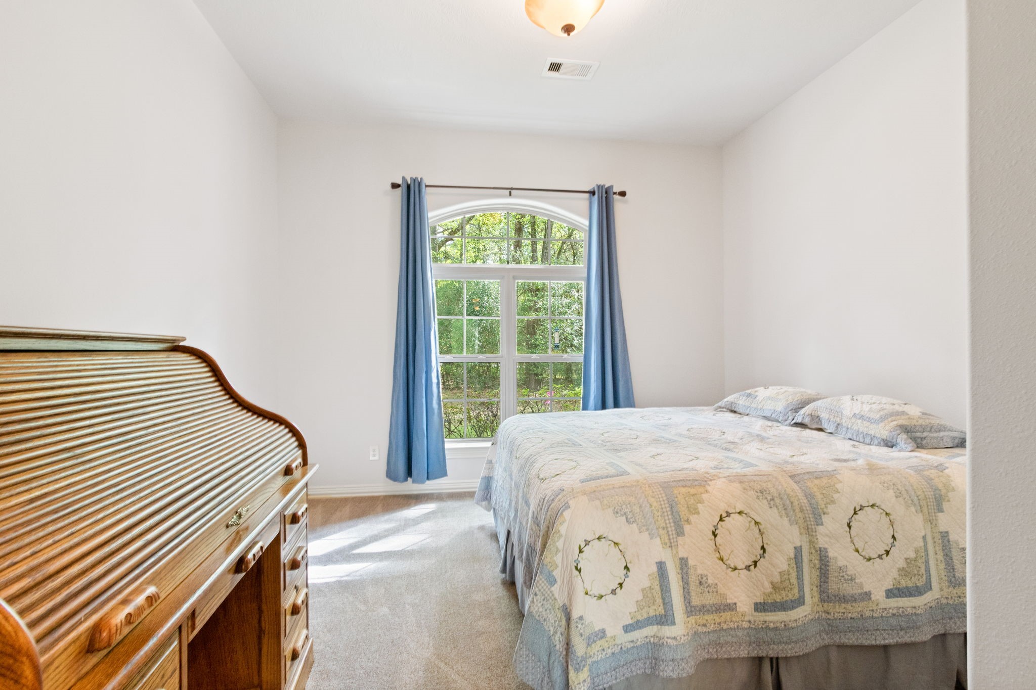 28007 Hickory Court Magnolia, TX 77355 - Photo 26 of 49 a bedroom with a bed and a window