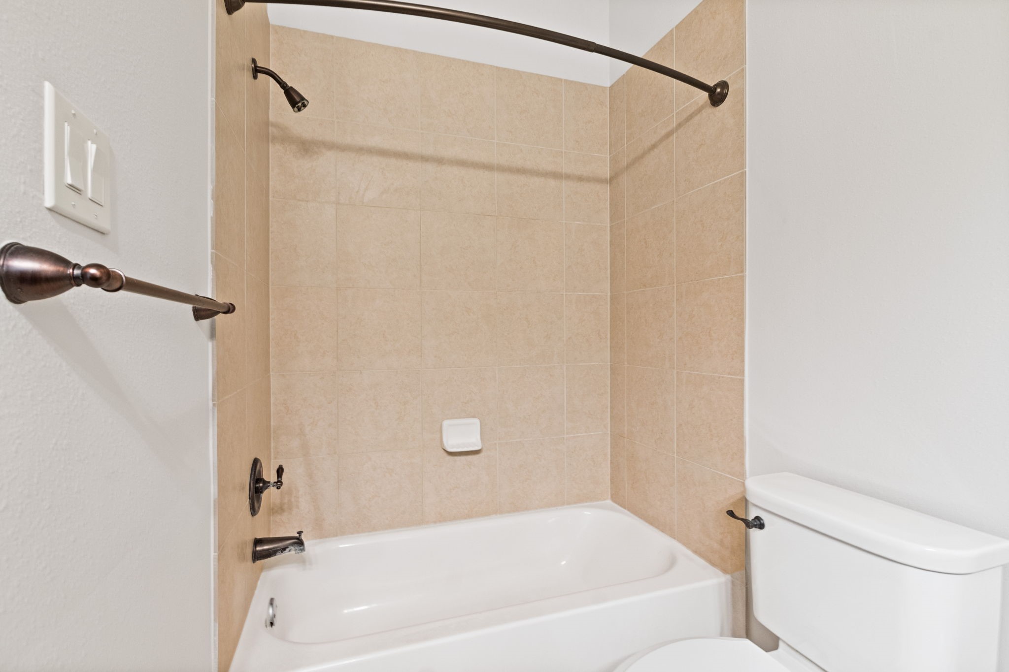 28007 Hickory Court Magnolia, TX 77355 - Photo 30 of 49 a bathroom with a bathtub and a shower