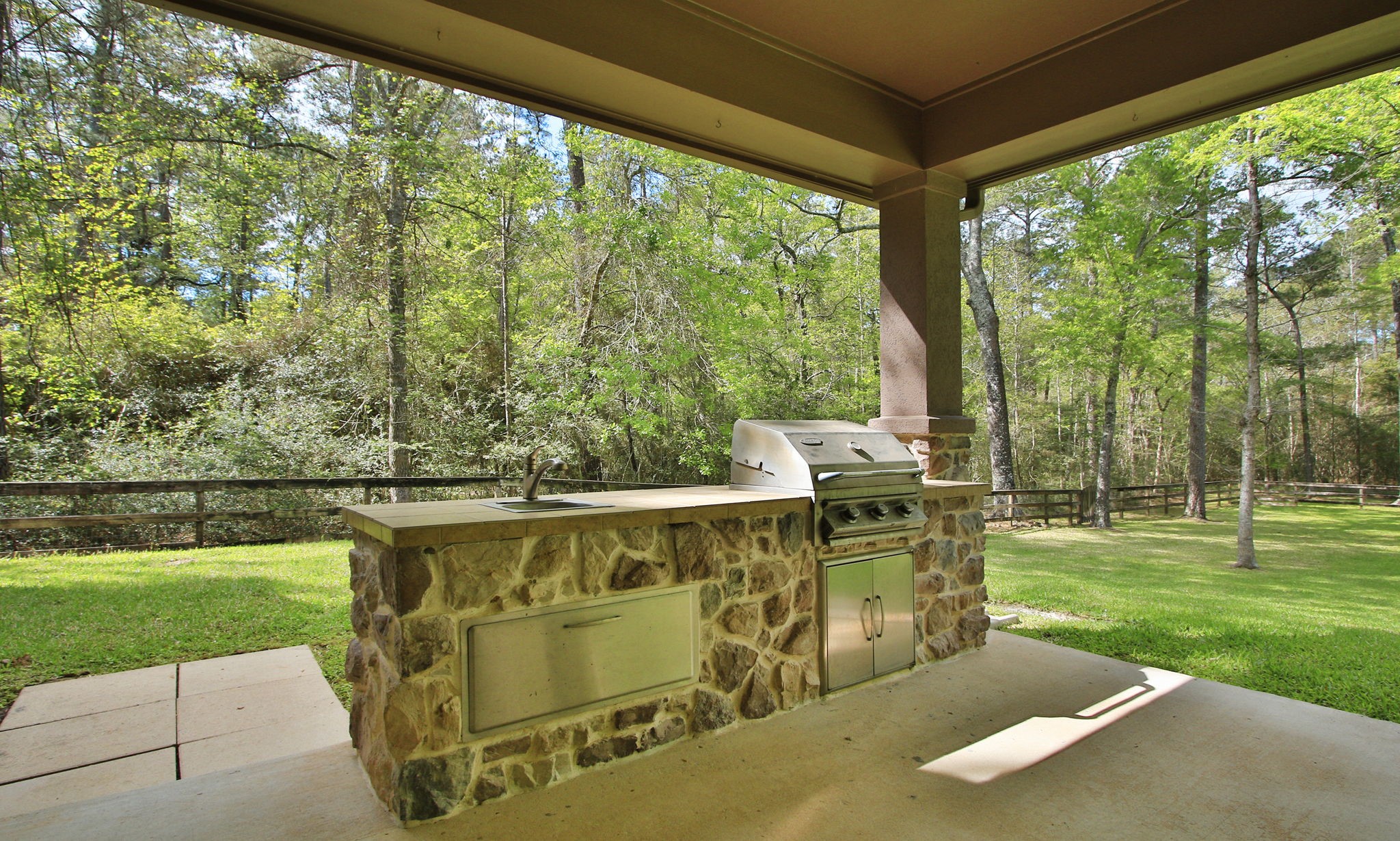 28007 Hickory Court Magnolia, TX 77355 - Photo 39 of 49 a view of a swimming pool with a patio