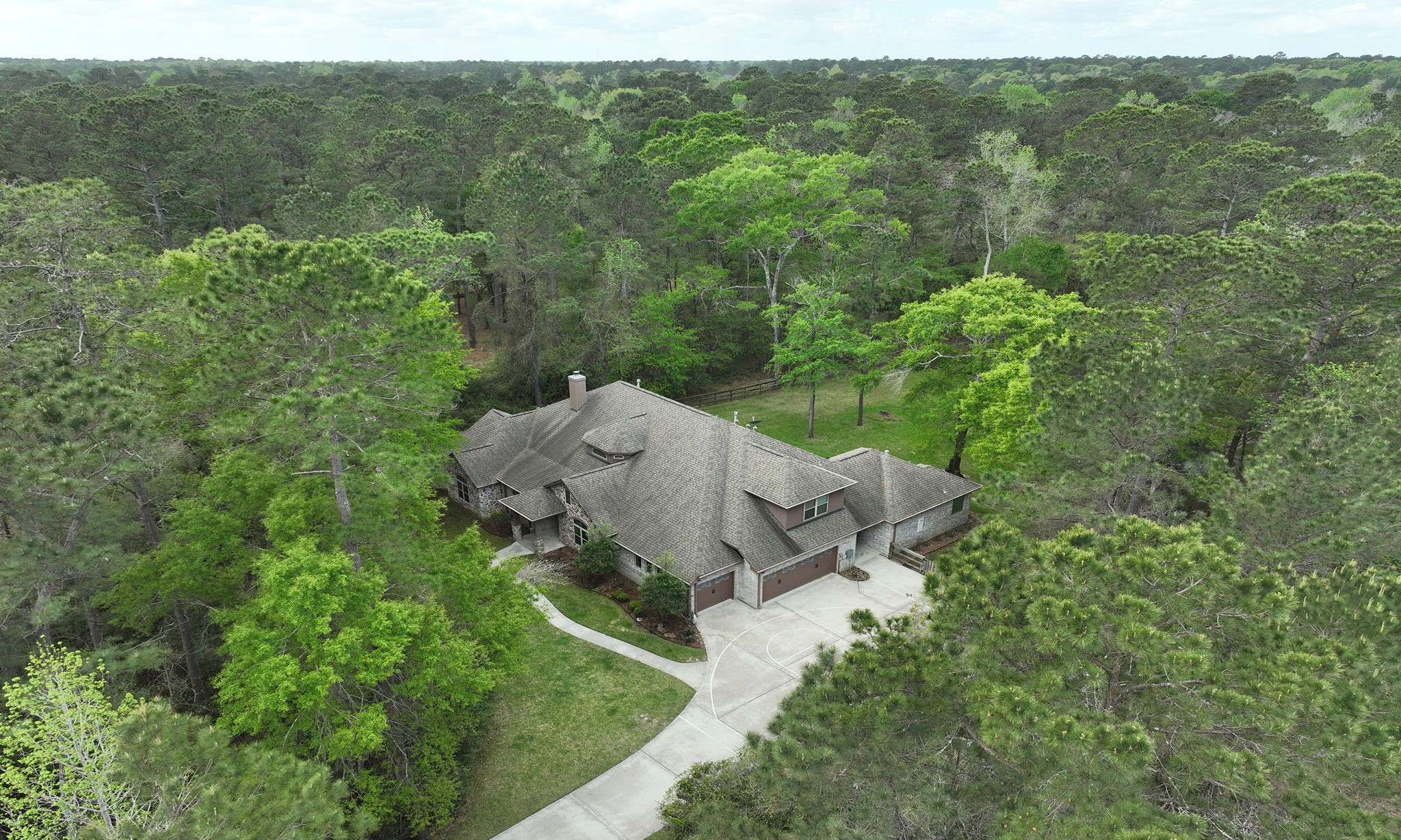 28007 Hickory Court Magnolia, TX 77355 - Photo 5 of 49 an aerial view of a house with mountain view