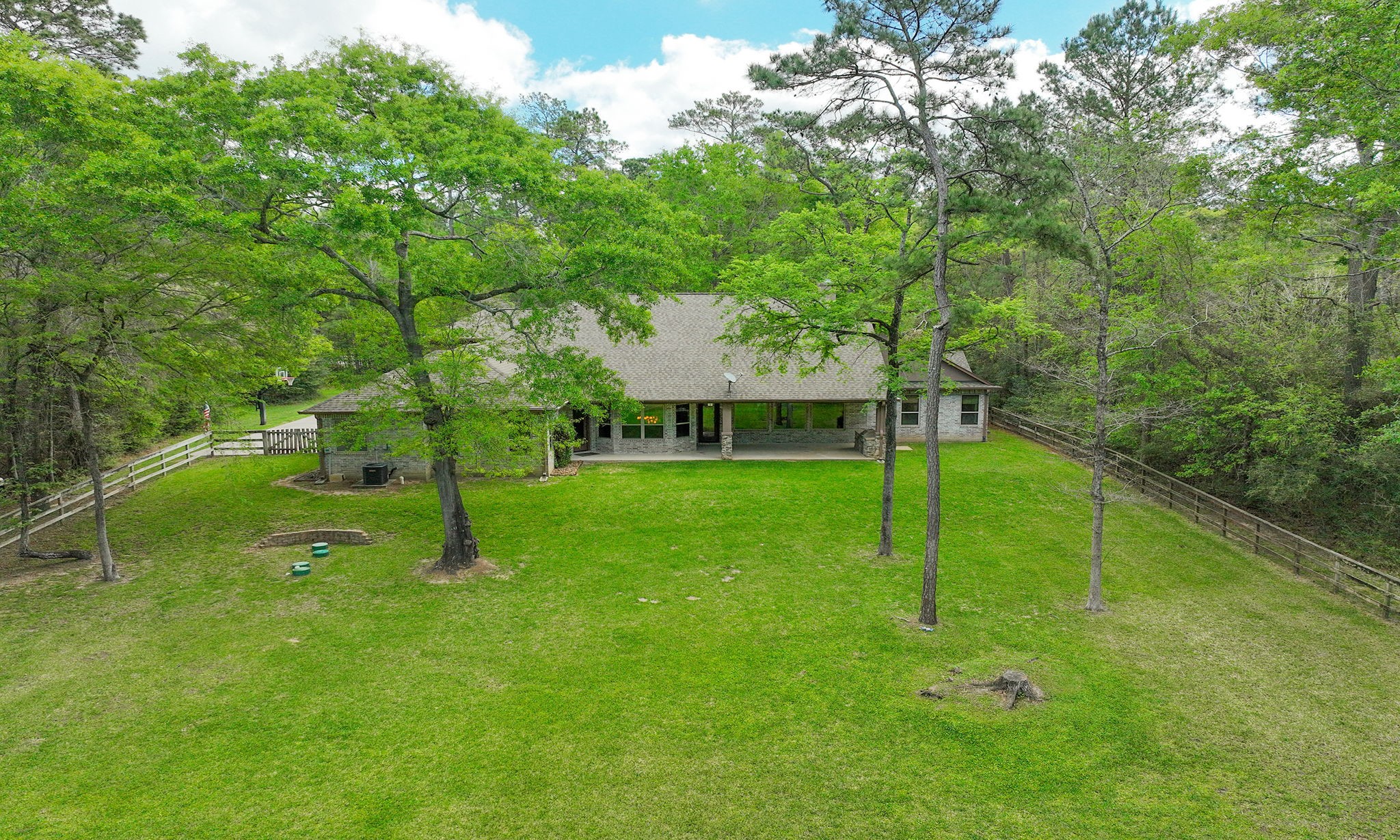 28007 Hickory Court Magnolia, TX 77355 - Photo 6 of 49 a view of a house with a backyard