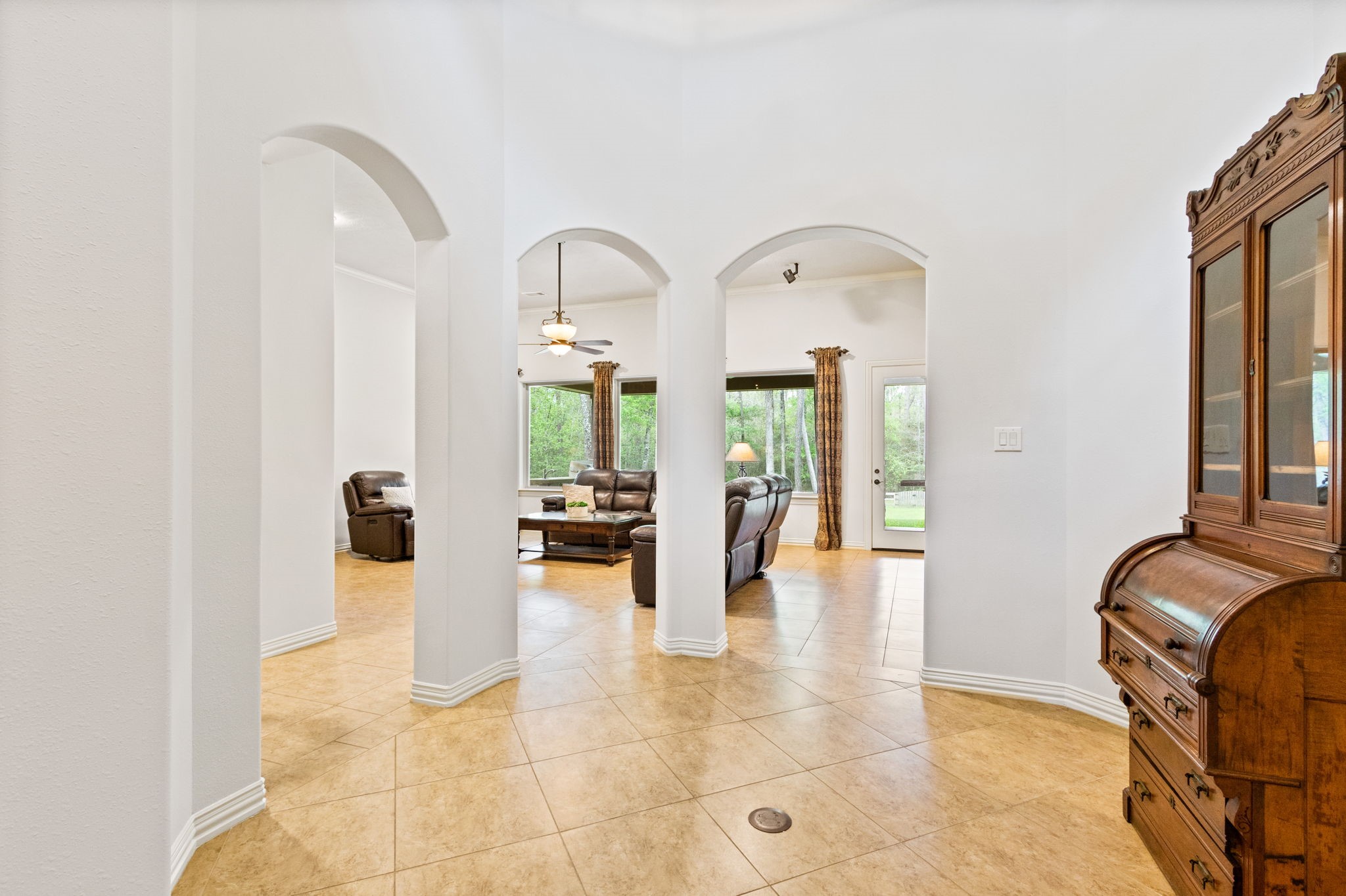 28007 Hickory Court Magnolia, TX 77355 - Photo 10 of 49 a lobby with furniture and floor to ceiling window