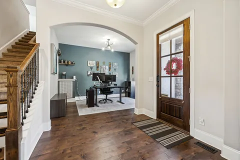 a bathroom with a granite countertop sink mirror and double