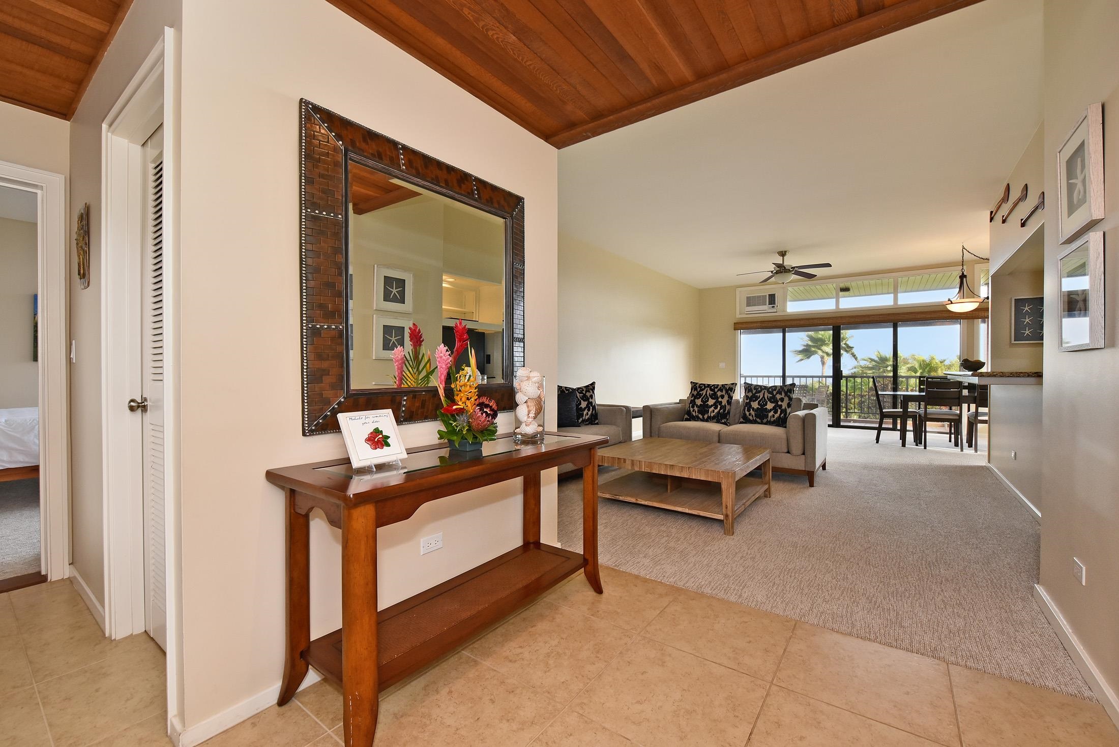 100 Ridge Road, Unit 101315 Lahaina, HI 96761 - Photo 13 of 23 a living room with furniture a table and chairs
